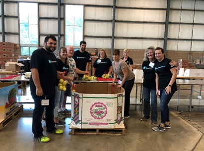 Brentwood Bank volunteers packing food items at Greater Pittsburgh Community Food Bank.