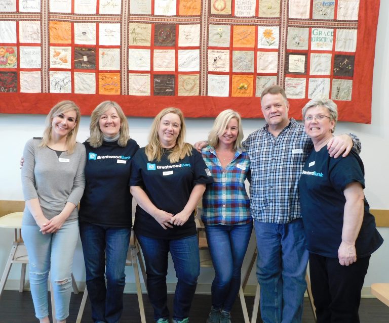 Group photo of Brentwood Bank volunteers at Women's Center and Shelter of Pittsburgh.